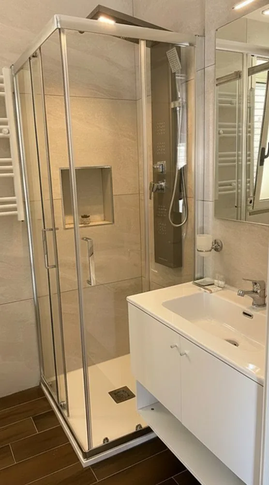 Box doccia in vetro e lavabo